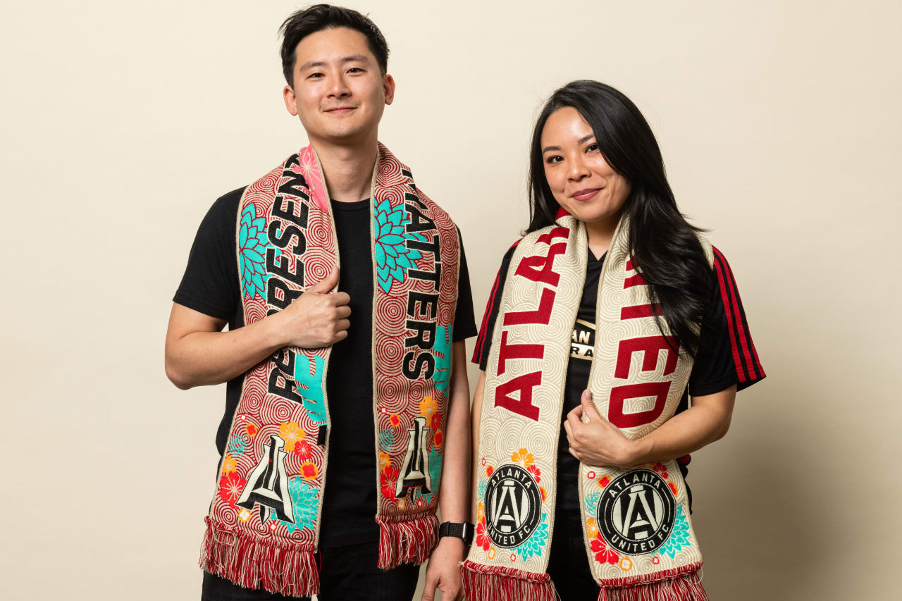 Atlanta United staff members model May Scarf of the Month on Tuesday, April 25, 2023.
