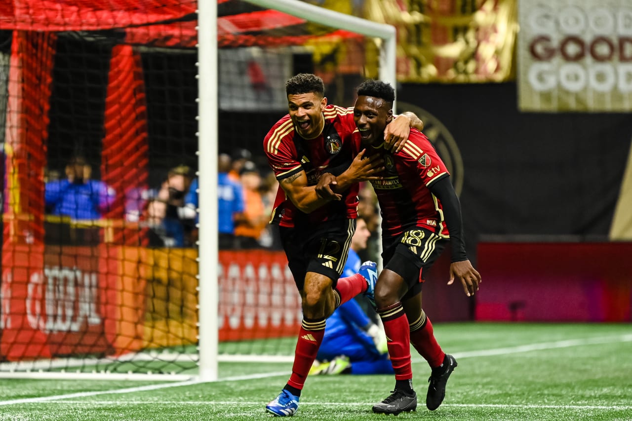 Atlanta United defender Miles Robinson #12 celebrates with teammates after a goal during the second half of the match against Columbus Crew at Mercedes-Benz Stadium in Atlanta, GA on Saturday, October 7, 2023. (Photo by Mitch Martin/Atlanta United)