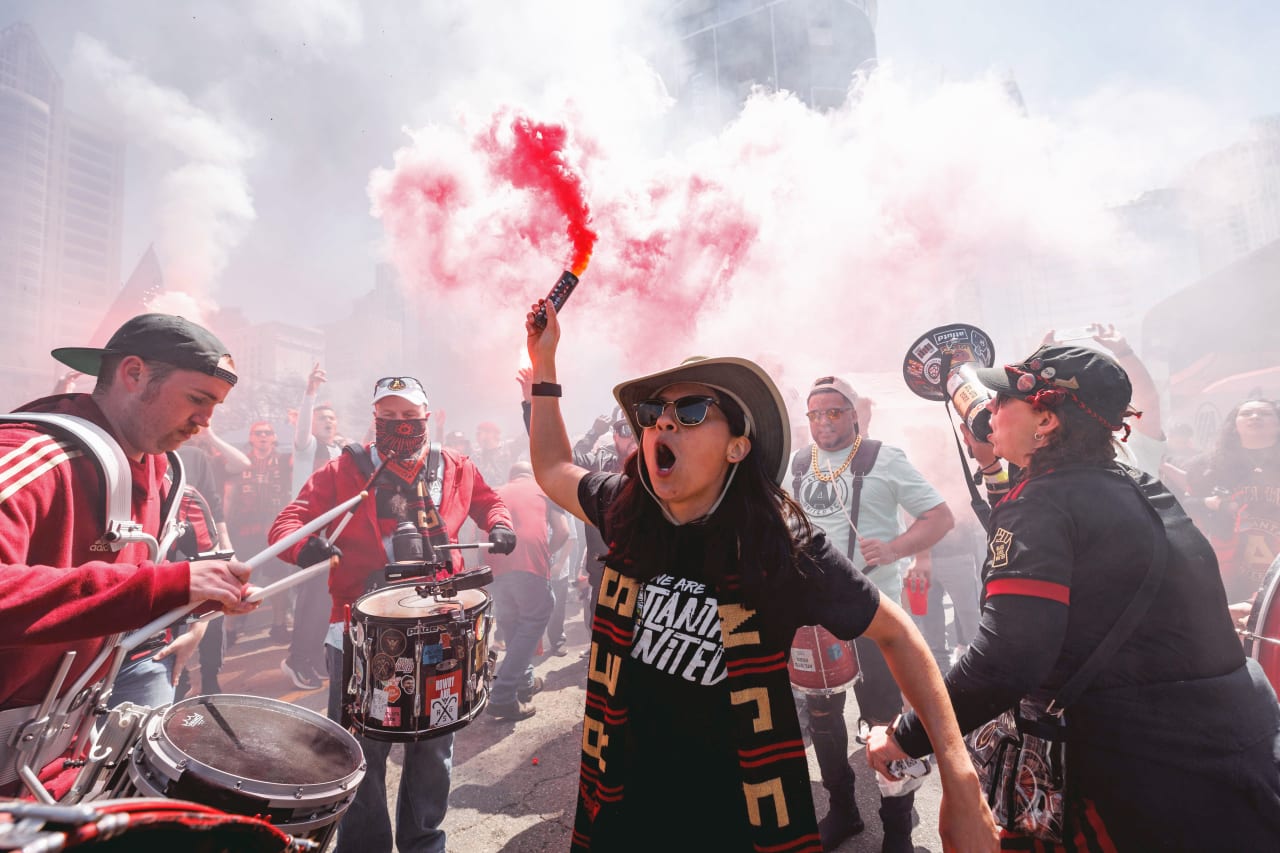 Atlanta United supporters march before the match against Charlotte FC at Bank of America Stadium in Charlotte, United States on Sunday April 10, 2022. (Photo by Karl Moore/Atlanta United)