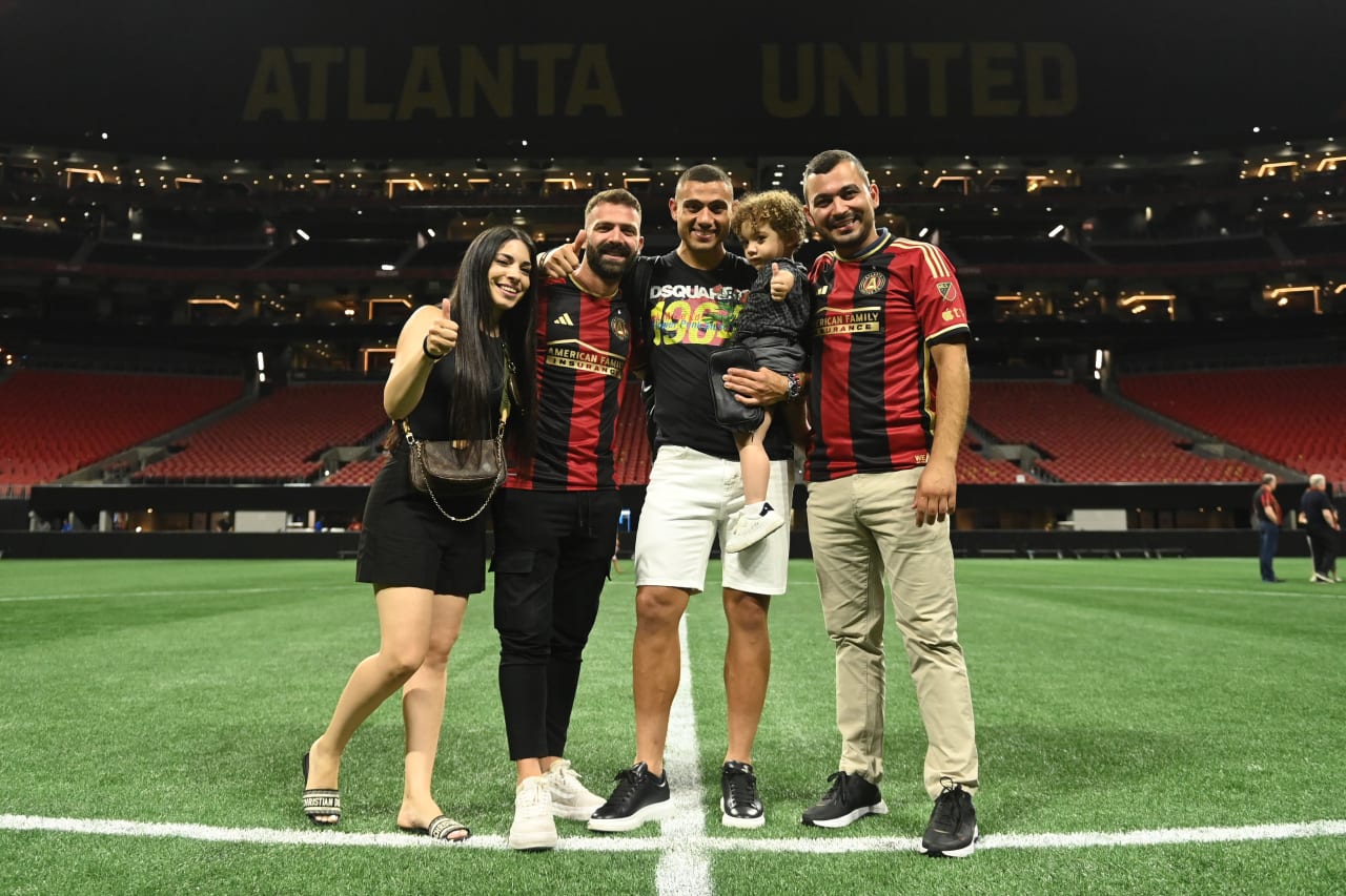 Atlanta United forward Giorgos Giakoumakis #7 is surprised by his family after the match against Orlando City at Mercedes-Benz Stadium in Atlanta, GA on Saturday, July 15, 2023. (Photo by Mitchell Martin/Atlanta United)