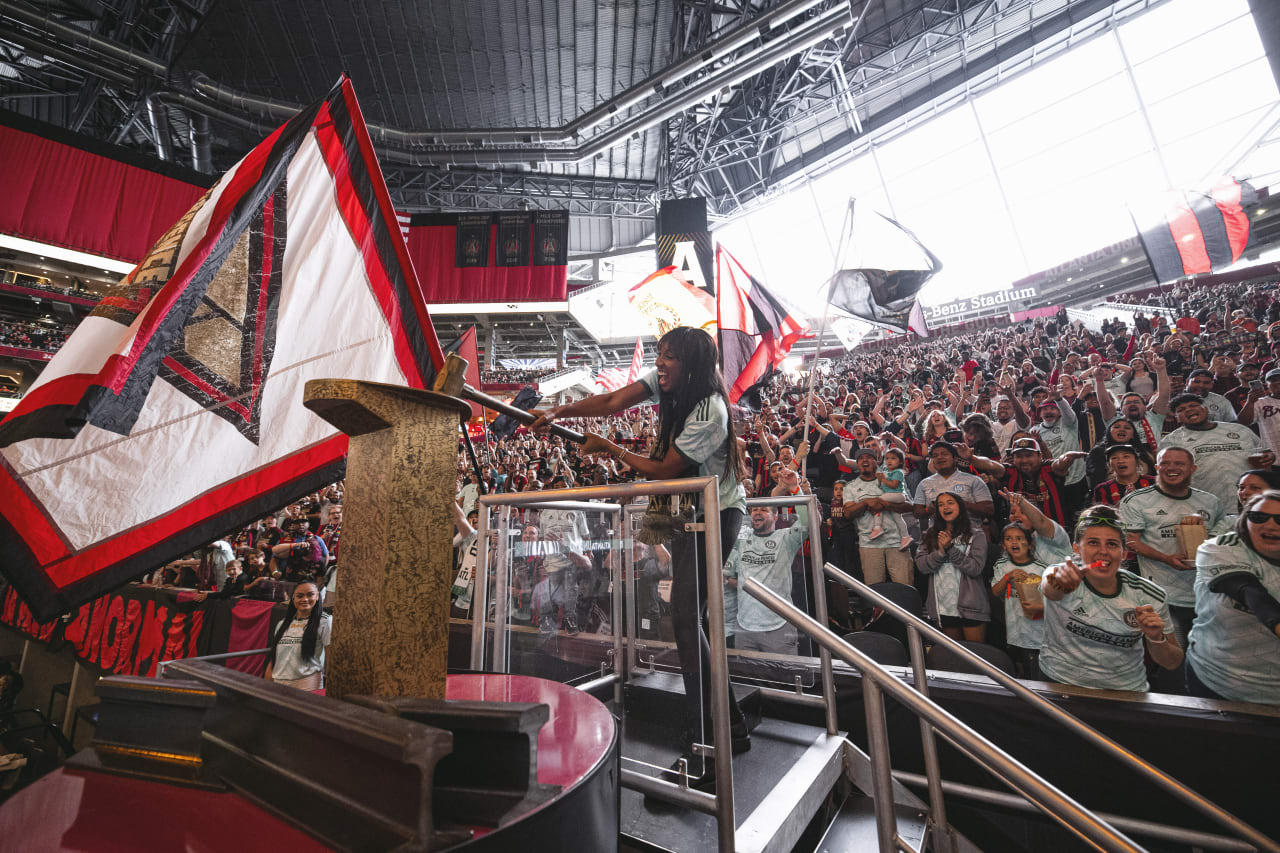 Sports Analyst Maria Taylor hits the golden spike before match against Chicago Fire FC at Mercedes-Benz Stadium in Atlanta, United States on Saturday May 7, 2022. (Photo by Kyle Hess/Atlanta United)