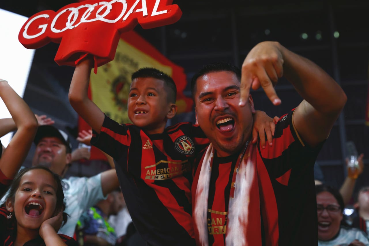Atlanta United fans celebrate after a goal during the match against Toronto FC at Mercedes-Benz Stadium in Atlanta, United States on Saturday September 10, 2022. (Photo by Casey Sykes/Atlanta United)