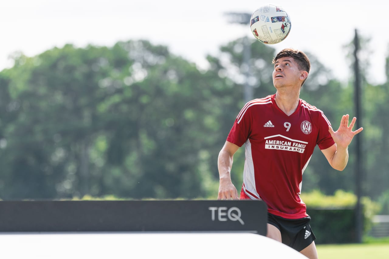 Atlanta United midfielder Matheus Rossetto #9 heads the ball during a game of soccer table tennis after training at Children's Healthcare of Atlanta Training Ground in Marietta, Georgia, on Thursday August 4, 2022. (Photo by Dakota Williams/Atlanta United)