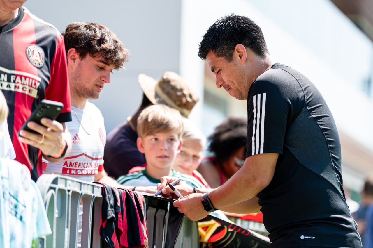 Atlanta United Head Coach Gonzalo Pineda signs an autograph after a training session at Children's Healthcare of Atlanta Training Ground in Marietta, Ga., on Wednesday, June 28, 2023. (Photo by Mitch Martin/Atlanta United)
