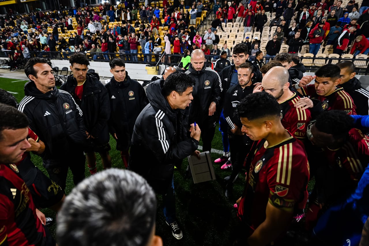 Atlanta United Head Coach Gonzalo Pineda addresses the team huddle during extra time of the Open Cup match against Memphis 901 FC at Fifth Third Bank Stadium in Kennesaw, GA on Wednesday April 26, 2023. (Photo by Mitchell Martin/Atlanta United)