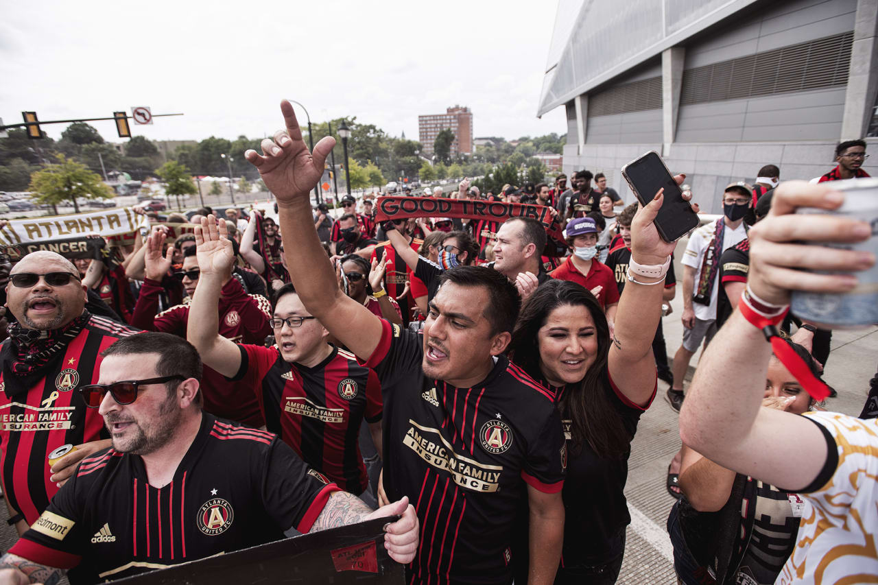 Atlanta United supporters march to the stadium before the match against D.C. United at Mercedes-Benz Stadium in Atlanta, Georgia on Saturday September 18, 2021. (Photo by AJ Reynolds/Atlanta United)