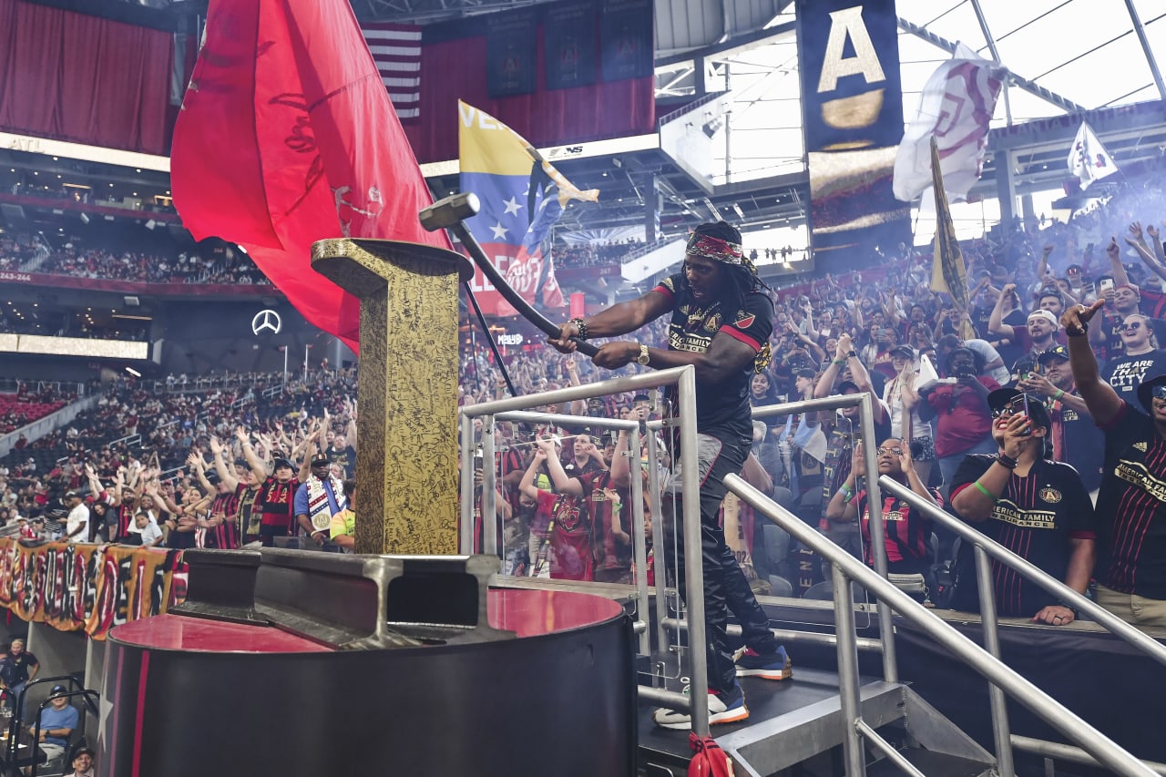 B.O.B hits the golden spike before the match against Orlando City at Mercedes-Benz Stadium in Atlanta, United States on Sunday July 17, 2022. (Photo by Kyle Hess/Atlanta United)