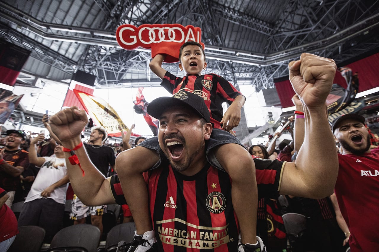 Atlanta United supporters cheer during the match against D.C. United at Mercedes-Benz Stadium in Atlanta, Georgia on Saturday September 18, 2021. (Photo by Matthew Grimes/Atlanta United)