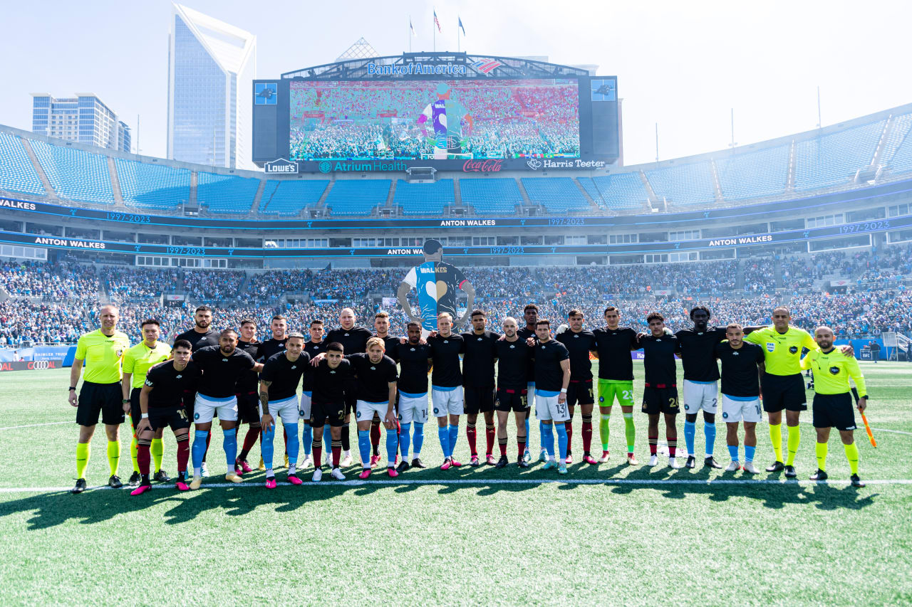 Both teams pose together to honor Anton Walkes before the match against Charlotte FC at Bank of America Stadium in Charlotte, North Carolina on Saturday, March11, 2023. (Photo by Mitch Martin/Atlanta United)