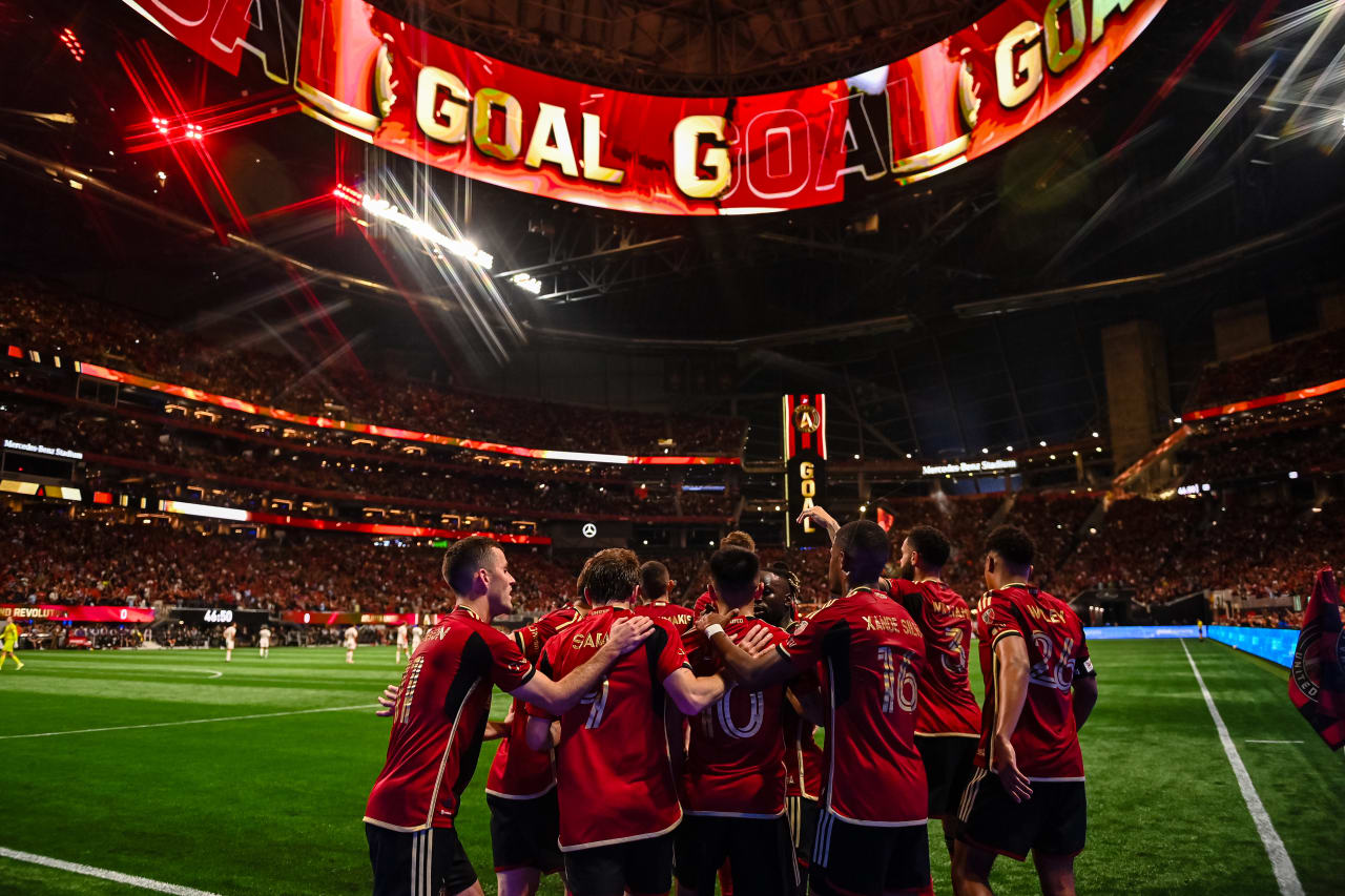 Atlanta United midfielder Thiago Almada #10 celebrates with teammates after a goal during the first half of the match against New England Revolution at Mercedes-Benz Stadium in Atlanta, GA on Saturday March 9, 2024
