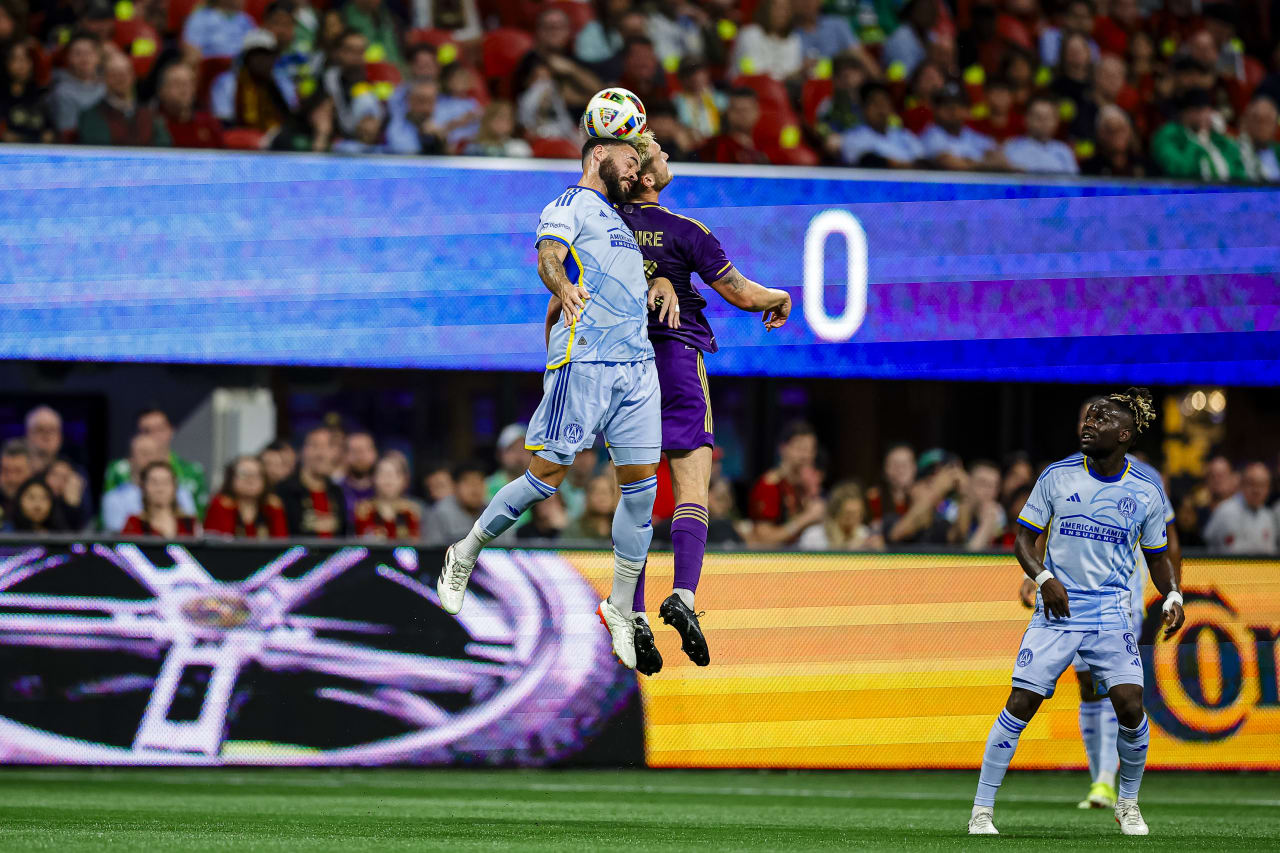 Atlanta United defender Derrick Williams #3 battles for a header during the first half of the match against Orlando City at Mercedes-Benz Stadium in Atlanta, GA on Sunday March 17, 2024