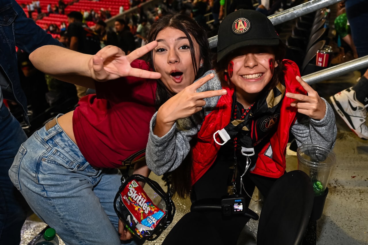 Atlanta United supporters pose for a photo during the match against Orlando City at Mercedes-Benz Stadium in Atlanta, GA on Sunday March 17, 2024