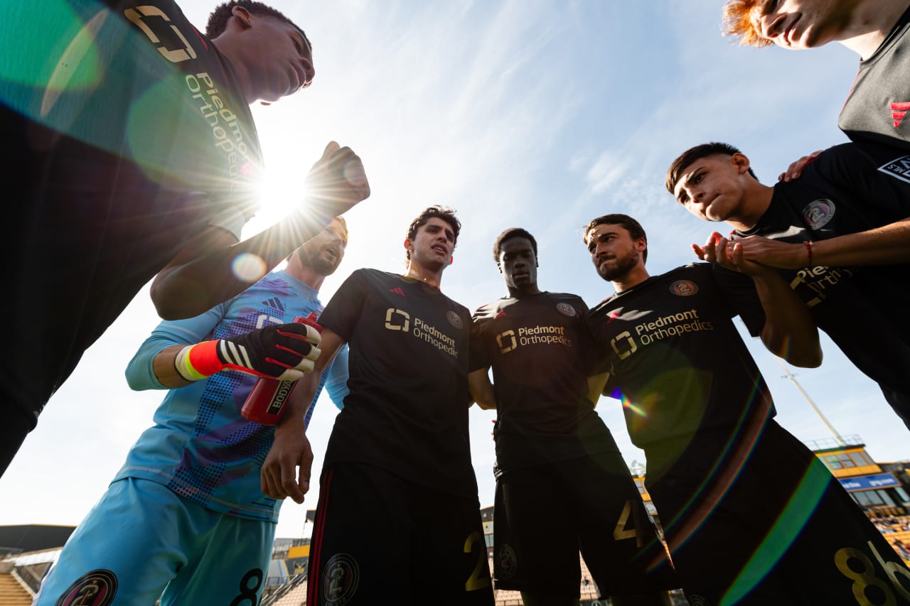 ATL UTD 2 players huddle before the match against Carolina Core at Fifth Third Bank Stadium in Kennesaw, Ga. On Sunday, March 24, 2024. (Photo by Julian Alexander/Atlanta United)