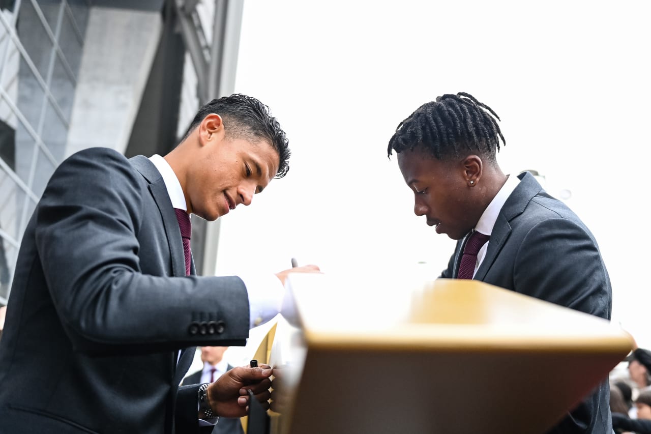 Atlanta United defender Ronald Hernandez #2 and midfielder Ajani Fortune #35 sign the golden spike before the match against Orlando City at Mercedes-Benz Stadium in Atlanta, GA on Sunday March 17, 2024