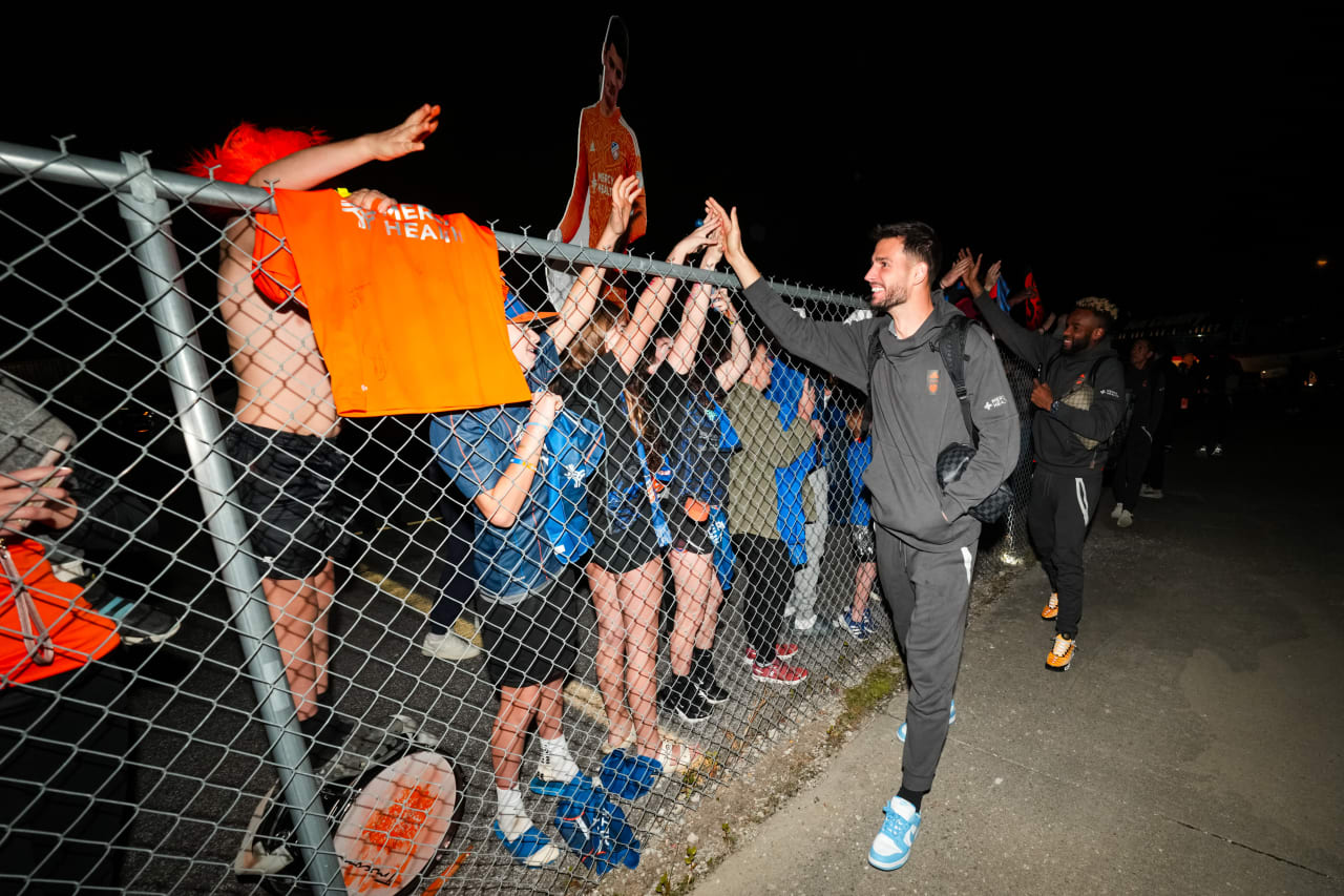 CINCINNATI, OHIO - NOVEMBER 5: FC Cincinnati celebrates with supporters after winning Round One Best of 3 of the MLS Cup Playoffs at Lunken Airport in Cincinnati, Ohio. (FC Cincinnati)