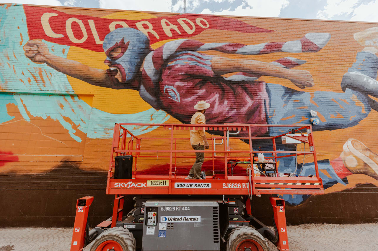 Found on 29th and Walnut in RiNo, Armando Silva's newest mural in collaboration with the Colorado Rapids is inspired by the euphoria soccer its fans. (Photos by Connor Pickett)