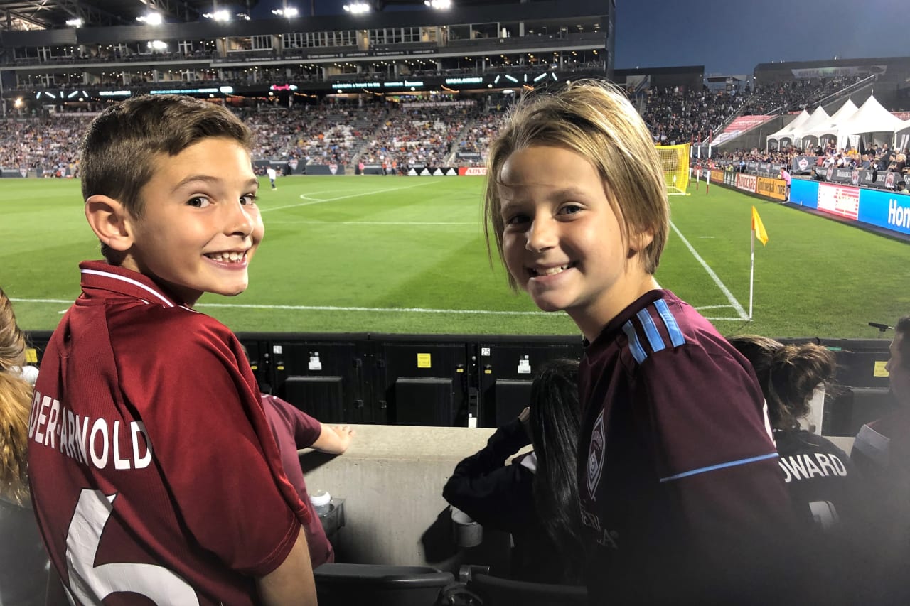 Emme Green has been attending Rapids games with friends and family since she was young. Her double-sided Support Local design features the Denver skyline and a topographic pattern to pay homage to the Colorado mountains.