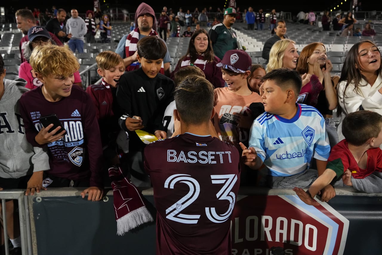 Cole Bassett signs autographs for fans after the Rapids' win over New England Revolution (Photo by Bart Young)