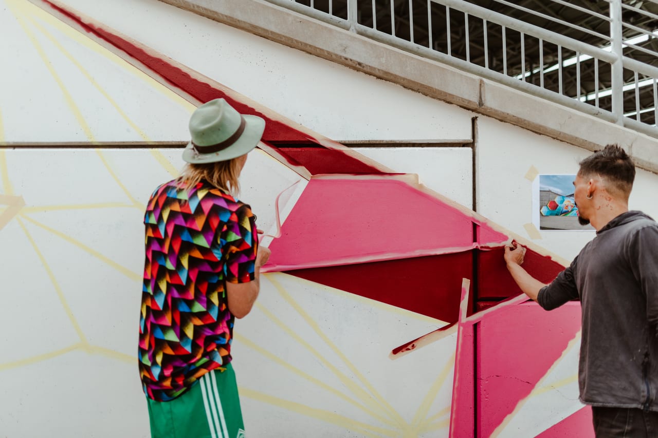 Local creator, artist, snowboarder and designer Pat Milbery paints his first mural celebrating Pride in DICK'S Sporting Goods Park as part of a multi-year, multi-platform partnership with the Colorado Rapids. (Photos by Connor Pickett)