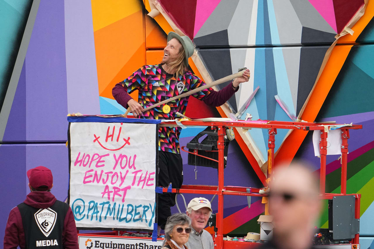Local creator, artist, snowboarder and designer Pat Milbery paints his first mural celebrating Pride in DICK'S Sporting Goods Park as part of a multi-year, multi-platform partnership with the Colorado Rapids. (Photos by Bart Young)