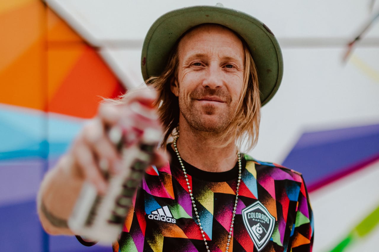 Local creator, artist, snowboarder and designer Pat Milbery paints his first mural celebrating Pride in DICK'S Sporting Goods Park as part of a multi-year, multi-platform partnership with the Colorado Rapids. (Photos by Connor Pickett)