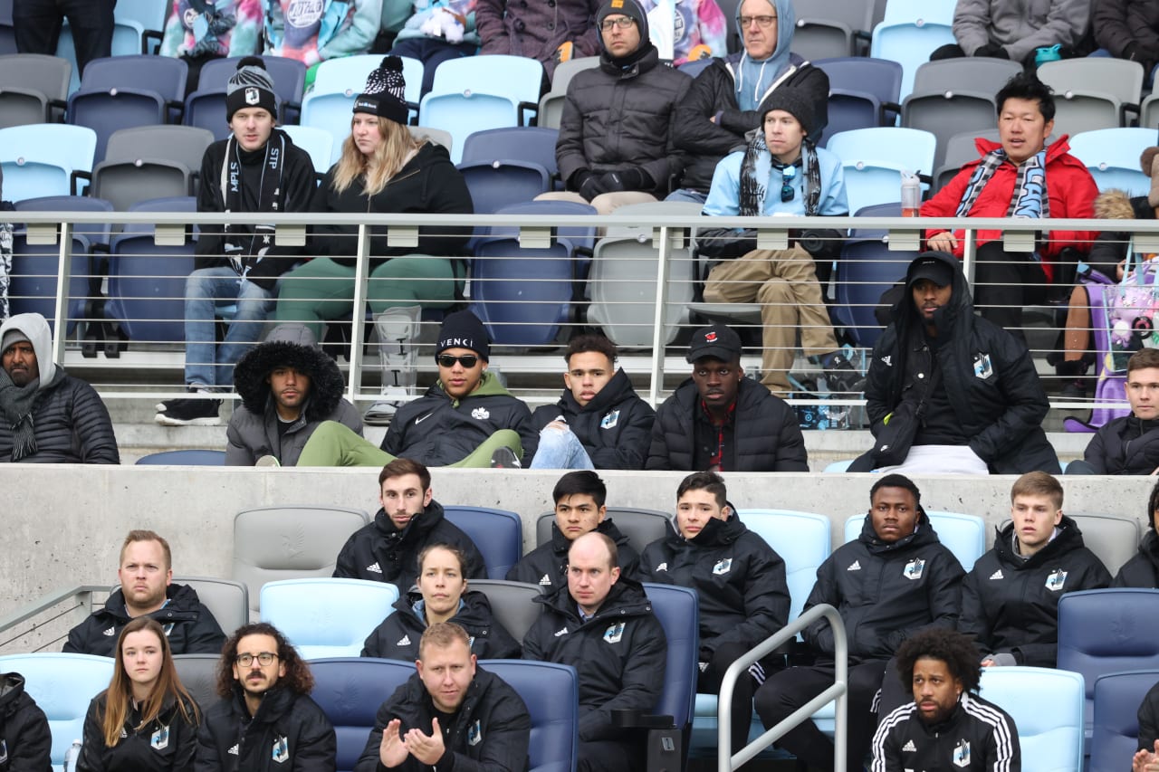 First team players watch from the stands
