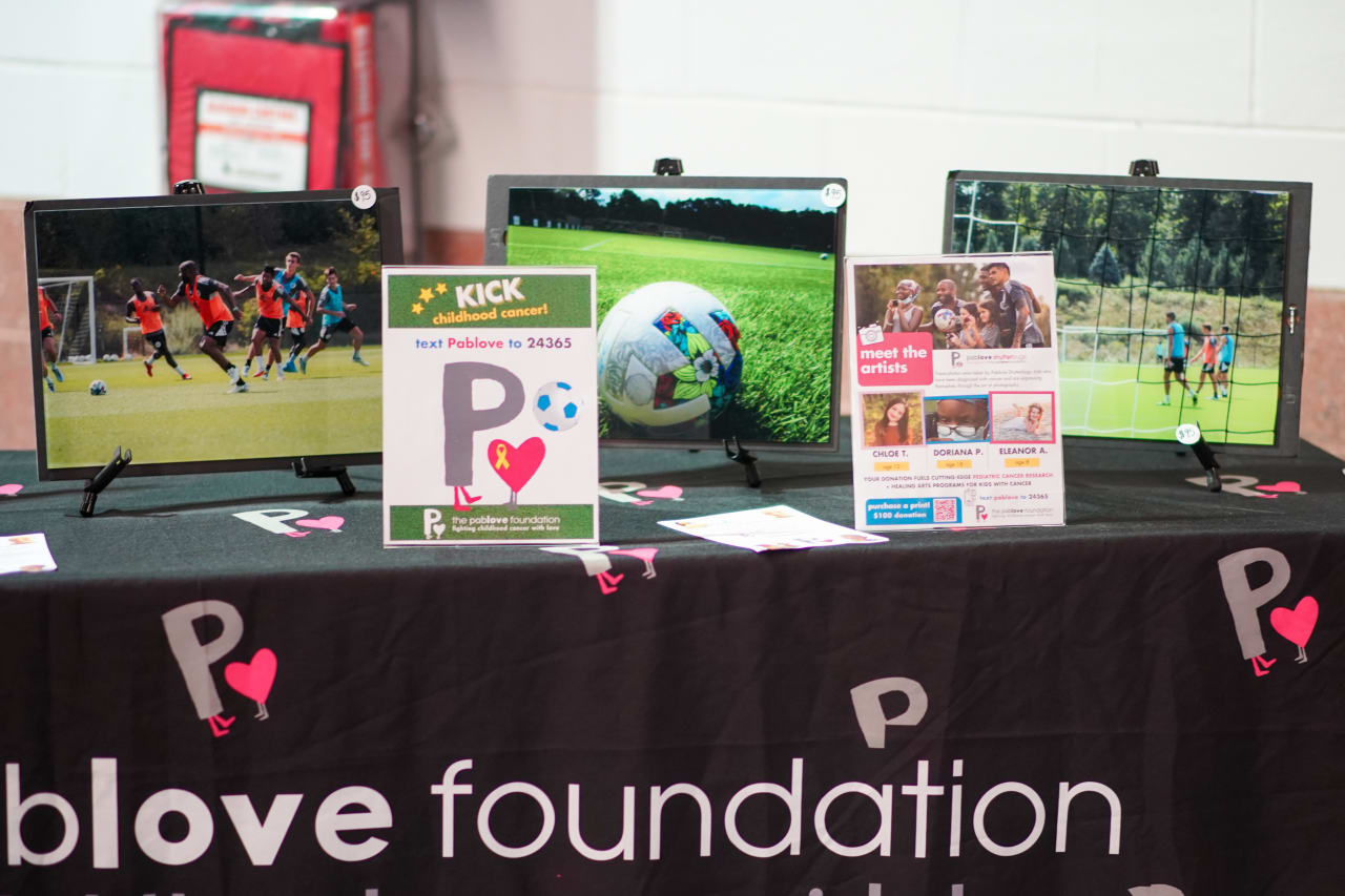 The Revs have teamed up with the Pablove Foundation for the first time, providing three local pediatric cancer survivors with an all-access experience at a recent Revolution training session. All three artists tested their photography skills at the Revolution's training session on August 24, and those photographs were printed on glass and displayed for sale at the Pablove Shutterbugs' Gallery located on the Gillette Stadium concourse during Saturday’s match against Montréal, with proceeds directly funding the Pablove Foundation's pediatric cancer research grants.
