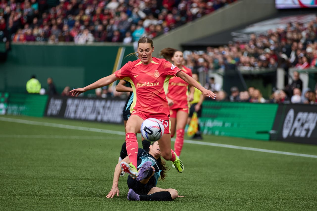 Thorns FC defender Marie Müller fights for a ball during the match.