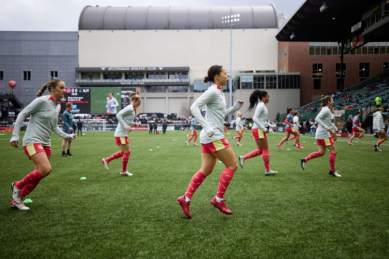 Thorns FC warm-up before their 2024 NWSL home opener.