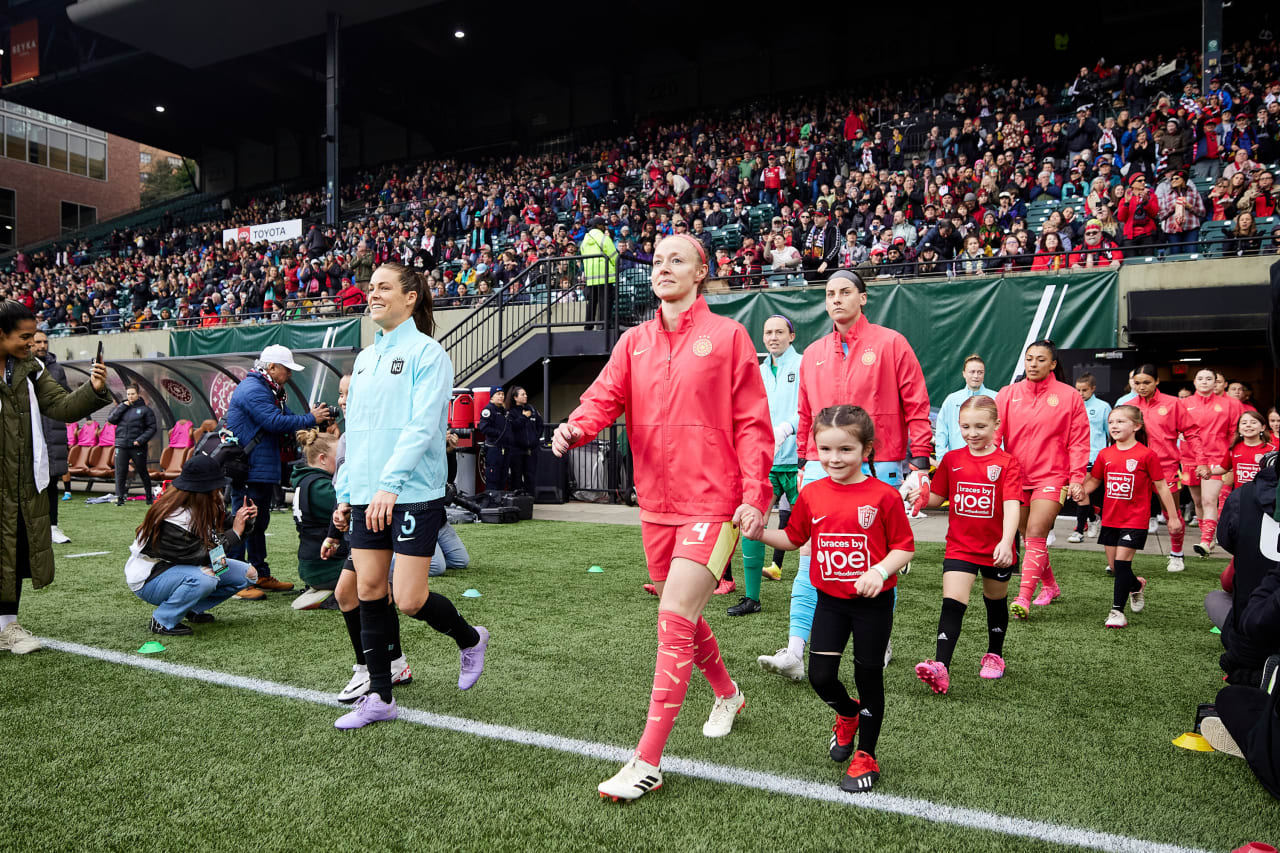 Thorns FC captain Becky Sauerbrunn leads the team out of the tunnel.