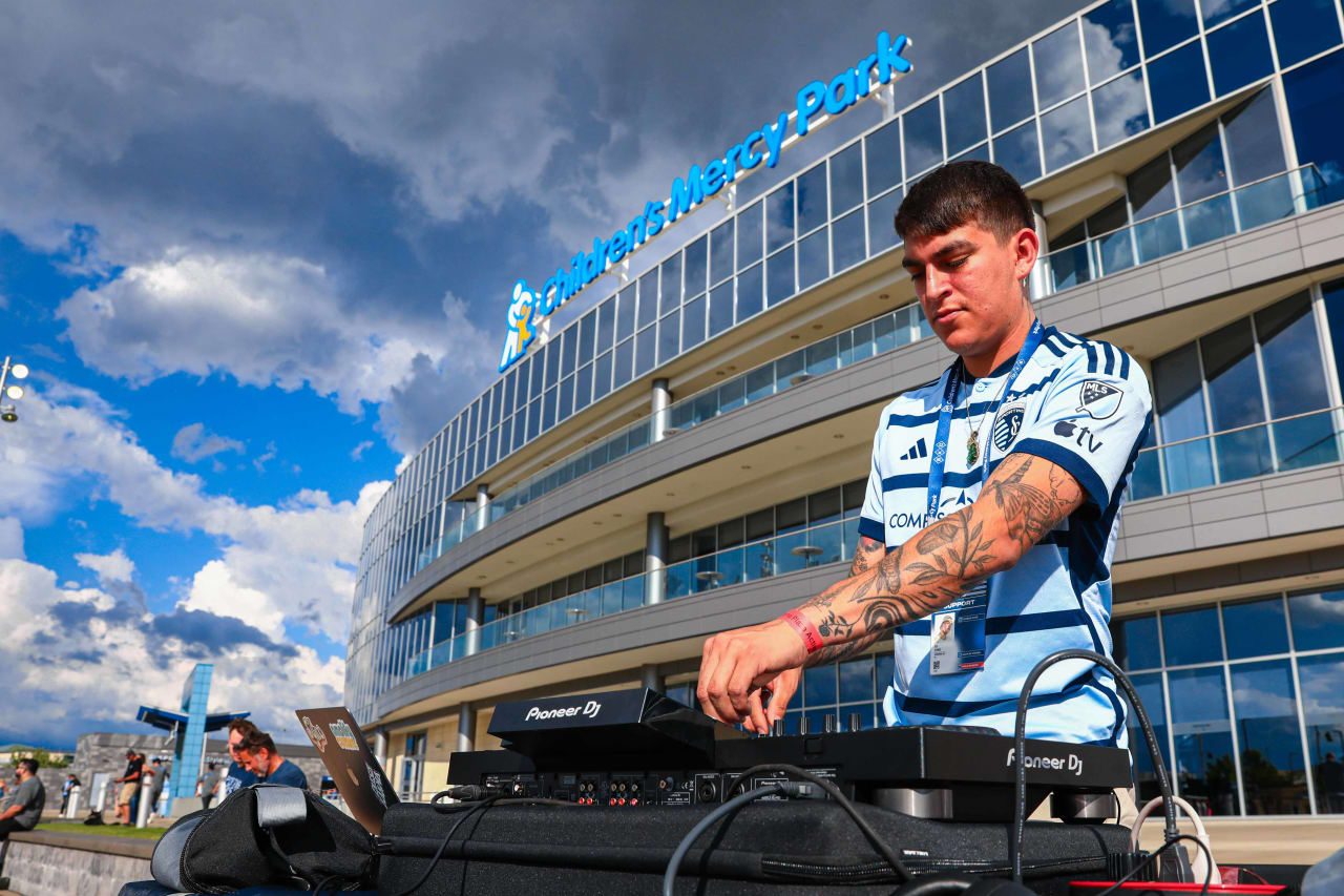 DJ Sync livens up the crowd on the Mazuma Plaza ahead of the Sporting KC vs Vancouver Whitecaps match.