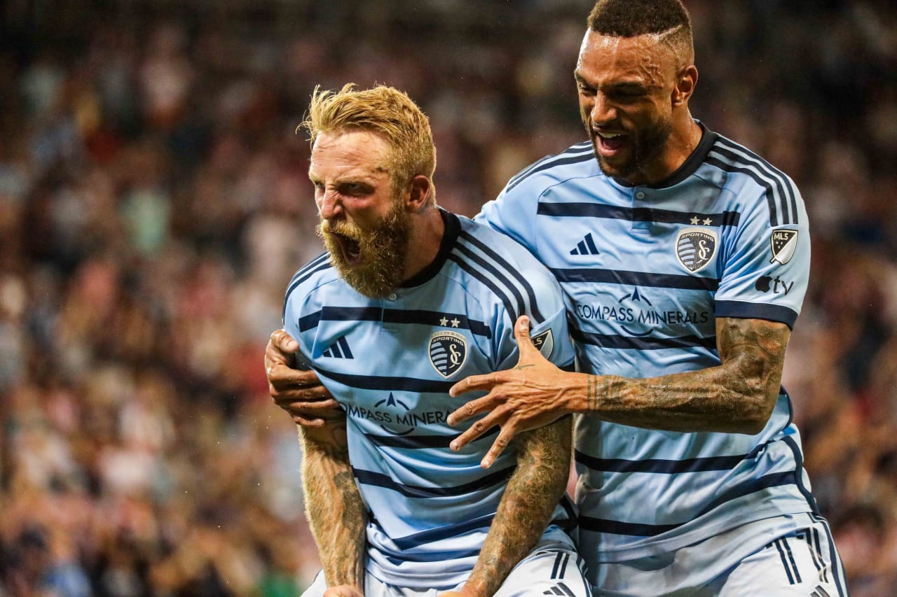 Johnny Russell celebrates his goal against Chivas with Khiry Shelton.