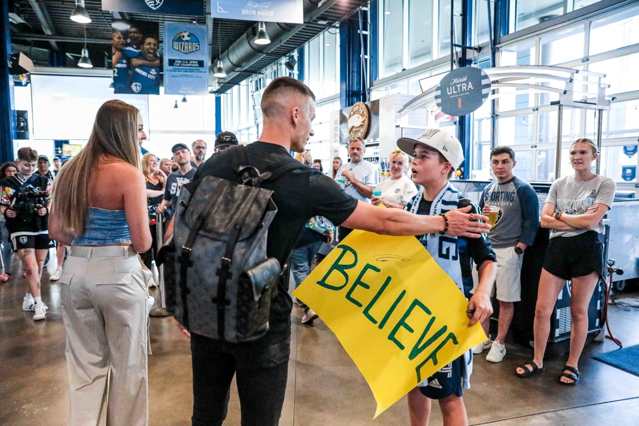 Erik Thommy talks with a young fan before the SKC vs FC Dallas match on May 31.