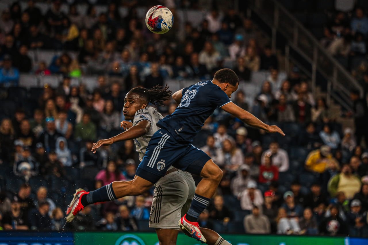 Logan Ndenbe goes for the header during the SKC vs MTL match.