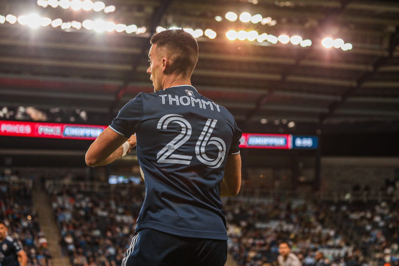 Erik Thommy makes a throw in during the SKC vs MTL match.