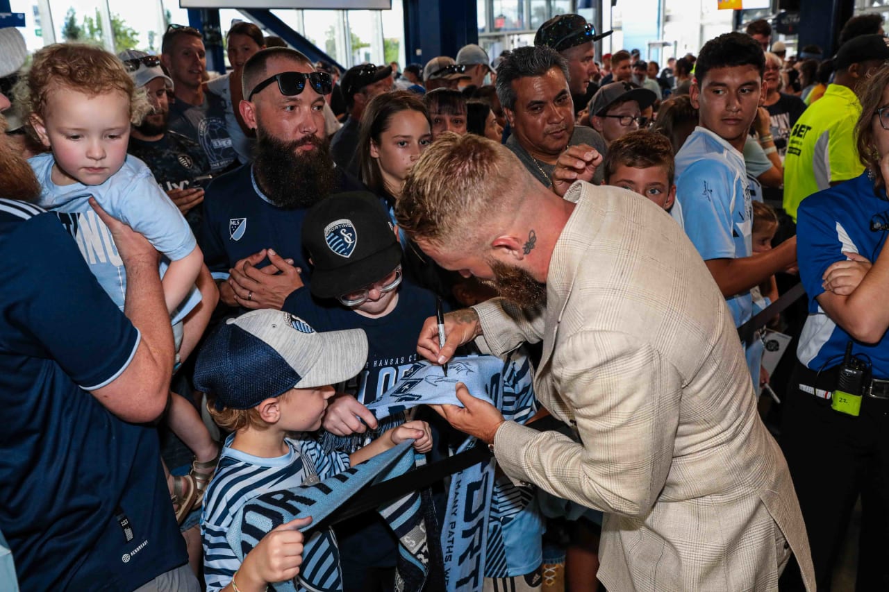 Captain Johnny Russell greets supporters in the Budweiser Brew House ahead of the Jul. 1 match.
