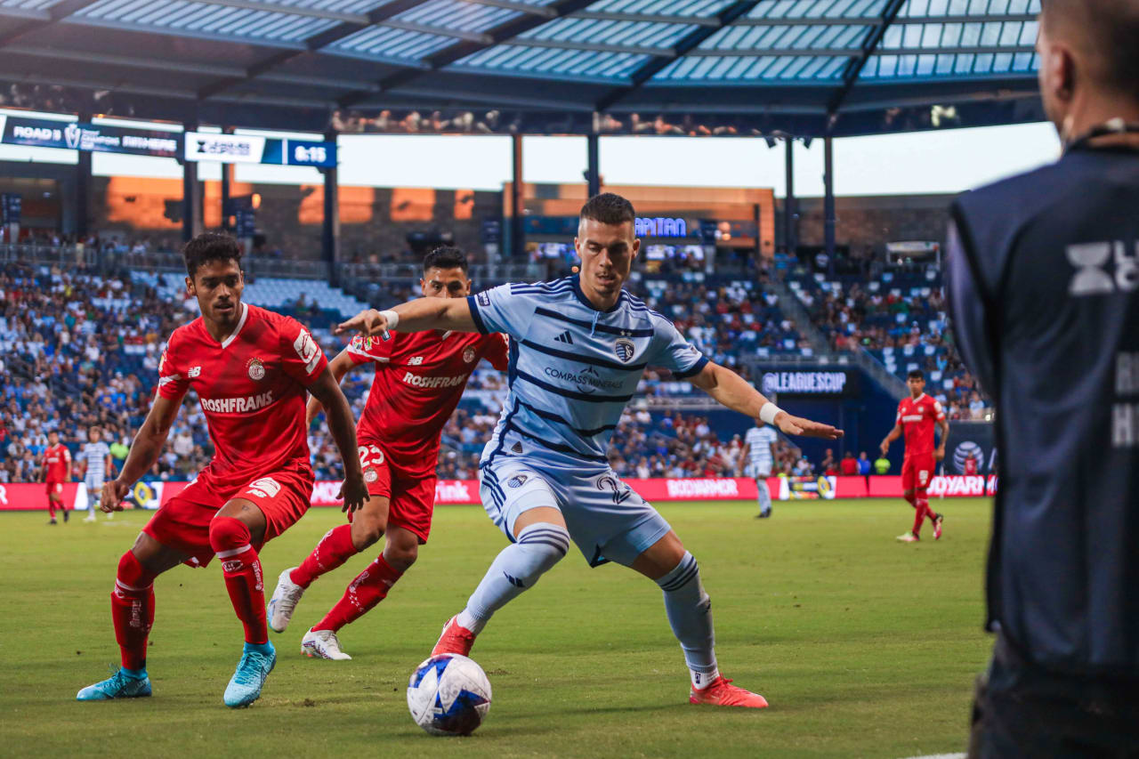 Erik Thommy keeps possession of the ball during the Aug. 4 match against Toluca.