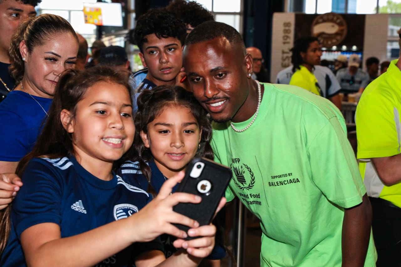 Gadi Kinda takes a picture with supporters in Budweiser Brew House ahead of the SKC vs CDG match on Jul. 31.