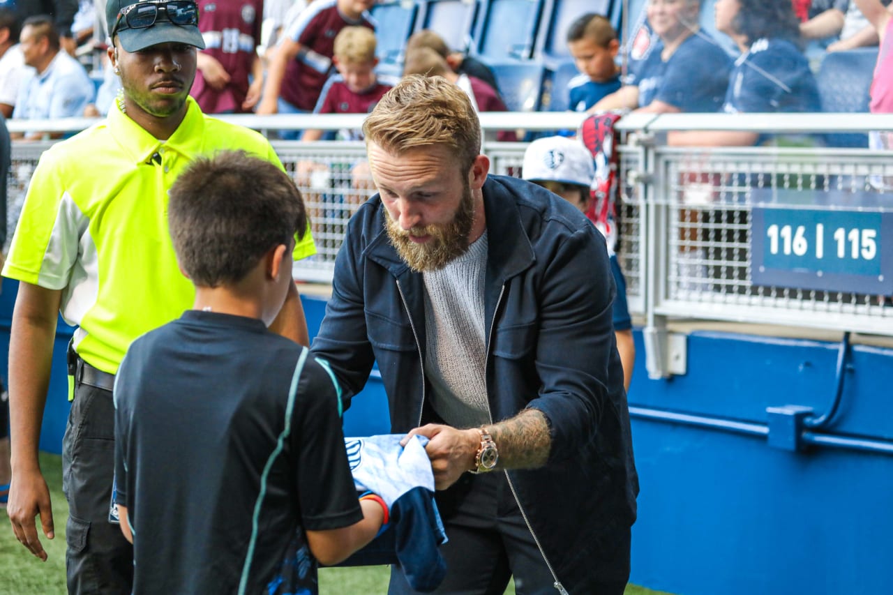 Captain, Johnny Russell stops and greets fans ahead of the SKC vs FC Dallas match.