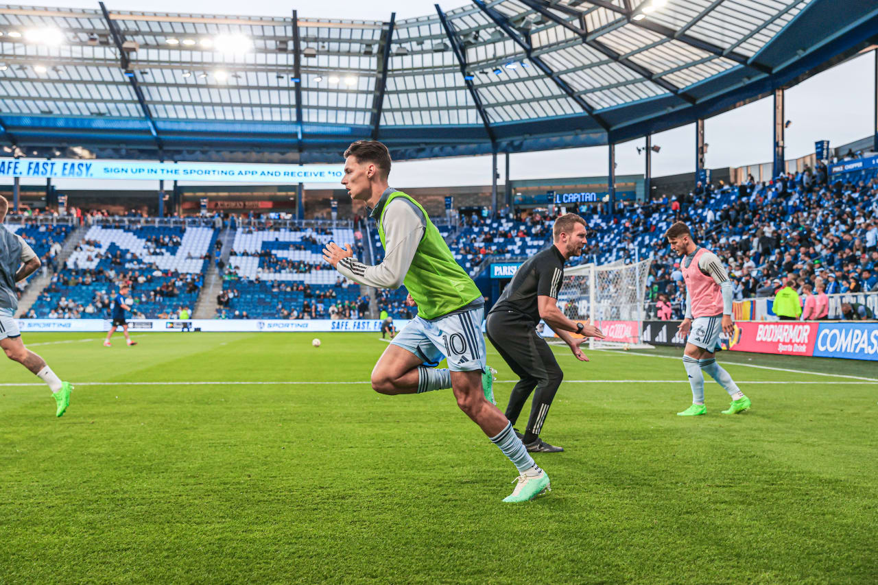 Sporting KC players do sprints during warms up ahead of the match.