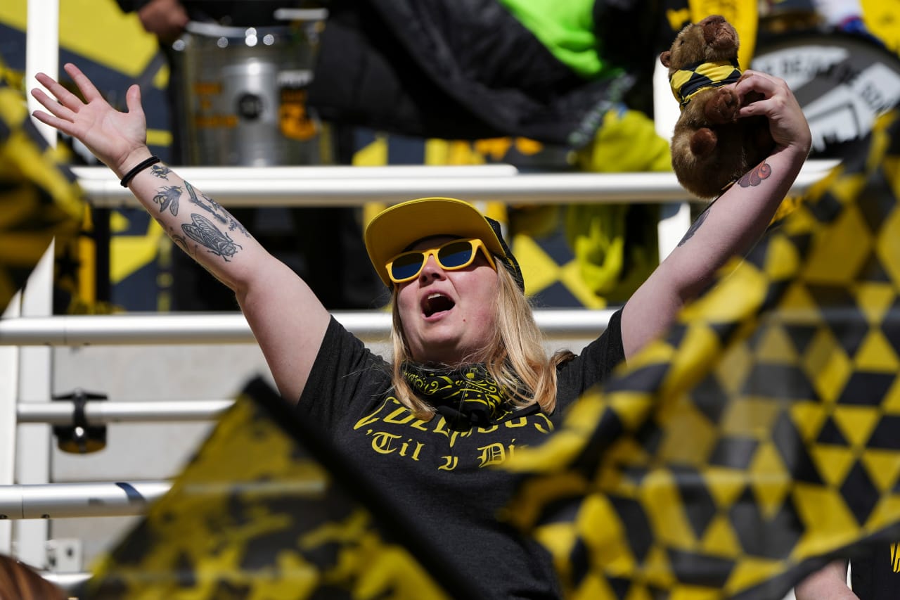 Crew 2 fans celebrate in the stands during the MLS NEXT Pro Cup