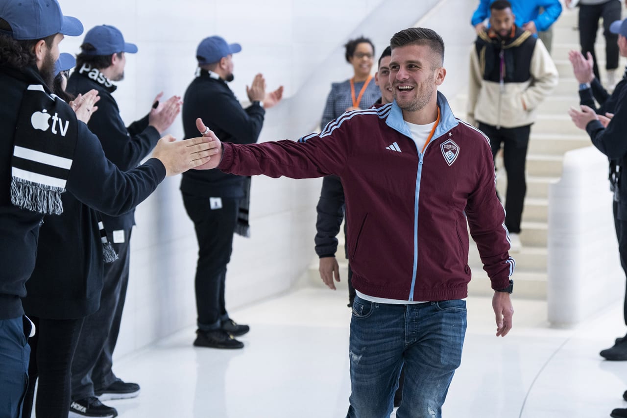 Colorado Rapids forward Diego Rubio high-fives Apple employees at Apple Park on Jan. 11, 2023.