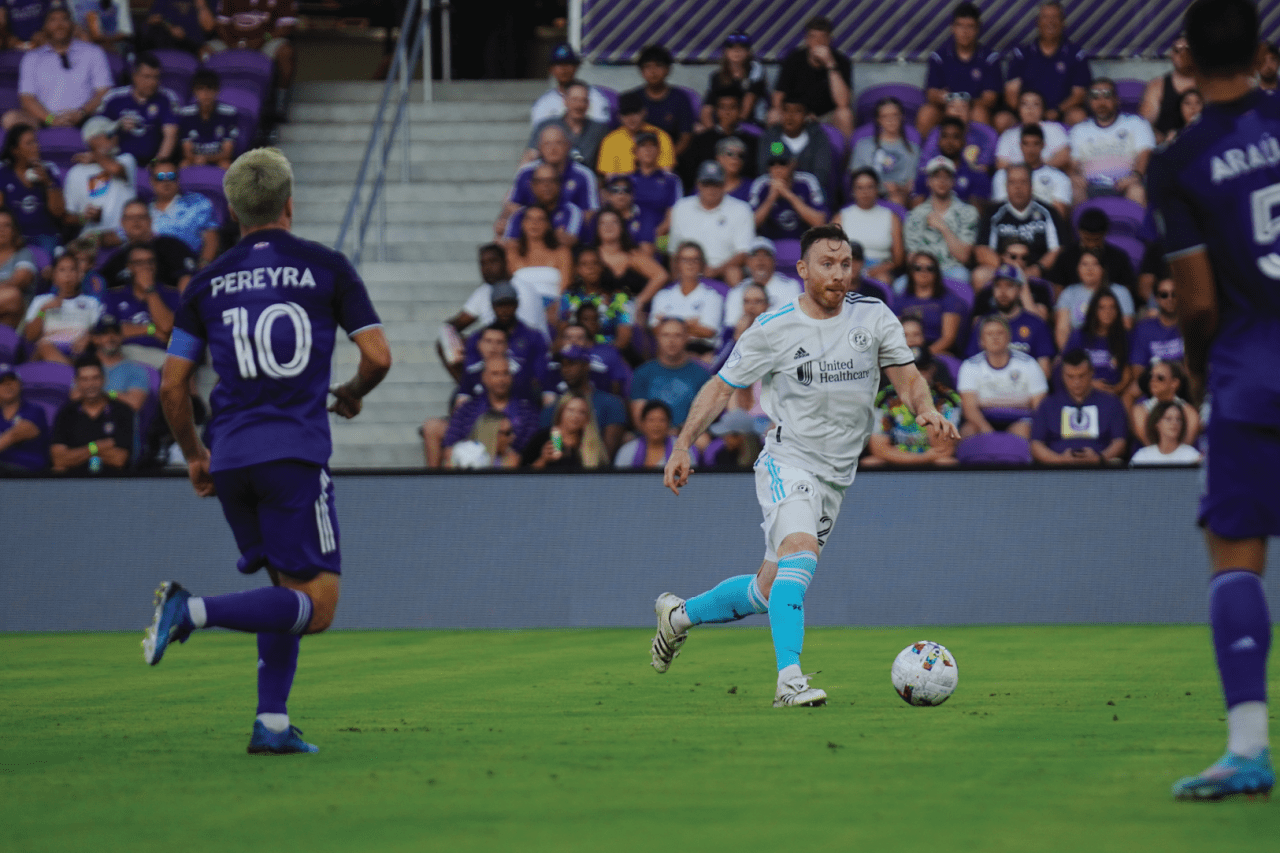 Tommy McNamara takes the ball up the pitch. Photos By: Conor Kvatek