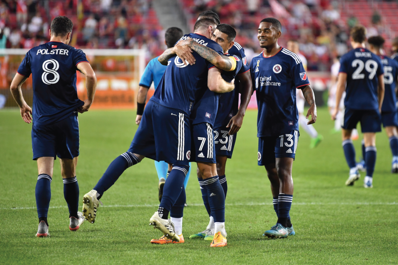 Bou the assist man gives the goalscorer a celebration hug. Photos By: Kim Montouro