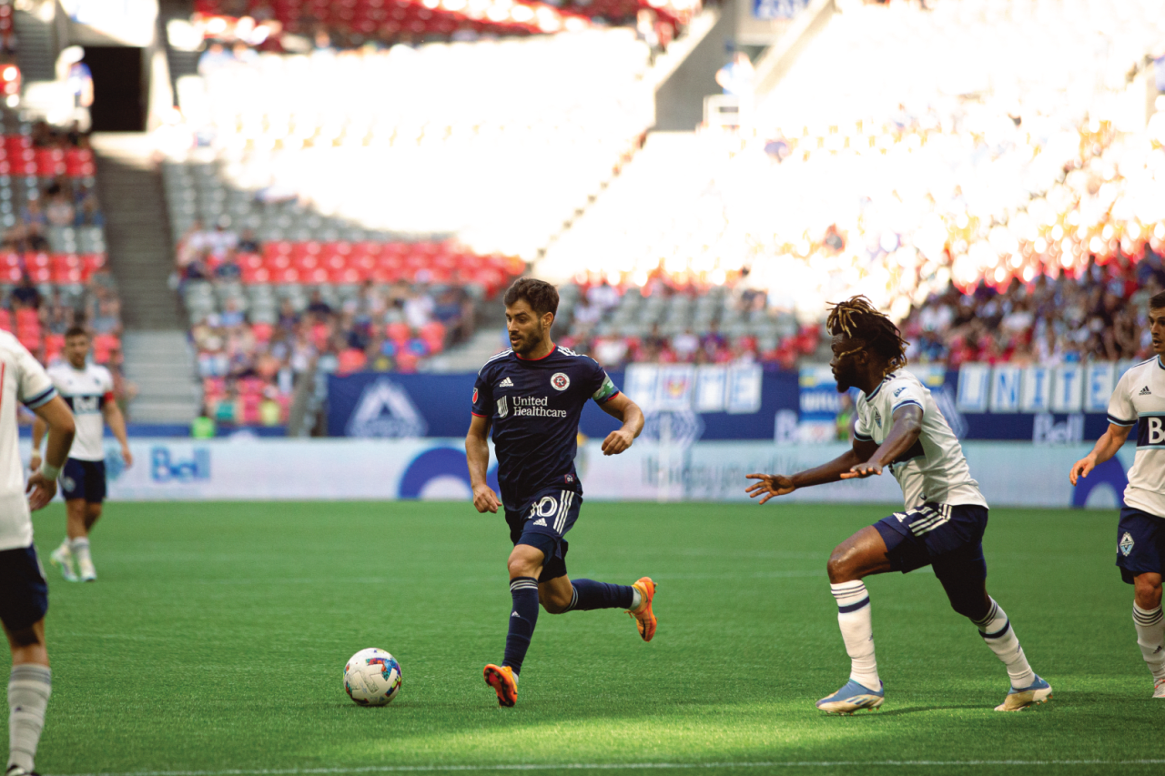 Carles Gil takes on the Vancouver defense. Photo By: Beau Chevalier