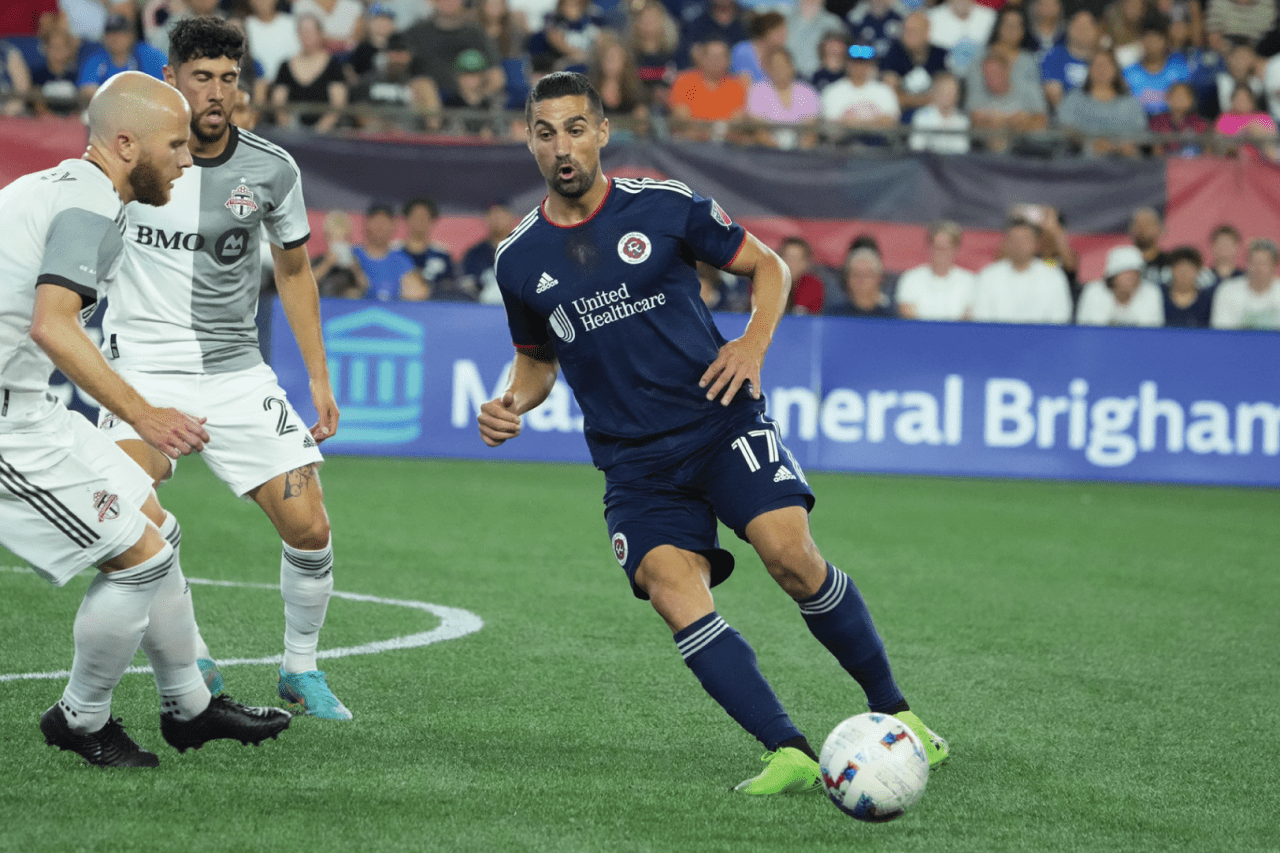 Lletget plays a pass on the halfway line. Photos By: David Silverman